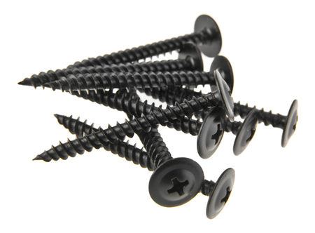 black self-tapping screws isolated on white backgroundの写真素材