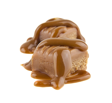 caramel isolated on a white background closeupの写真素材