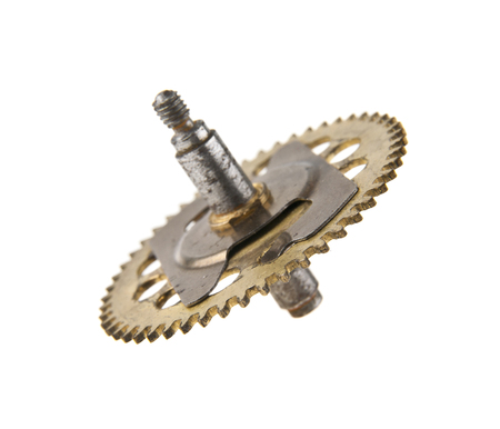 gears from old clock isolated on white backgroundの写真素材