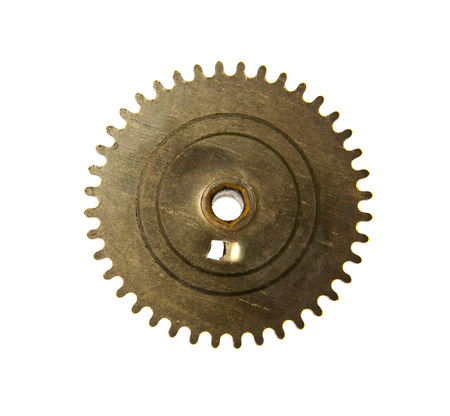 gears from old clock isolated on white backgroundの写真素材