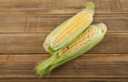 corn on a wooden tableの写真素材