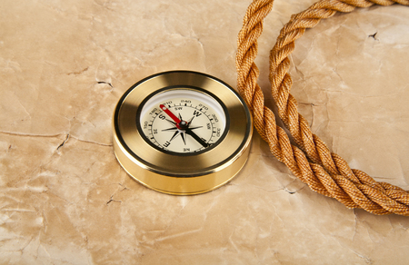 compass and rope on old paper backgroundの写真素材