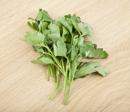 parsley on a wooden backgroundの写真素材