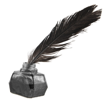 inkpot with a pen isolated on a white backgroundの写真素材