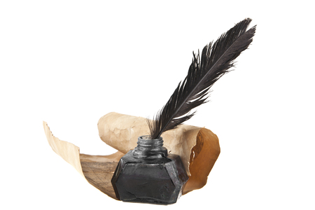 old paper and inkwell with pen isolated on white background closeupの写真素材
