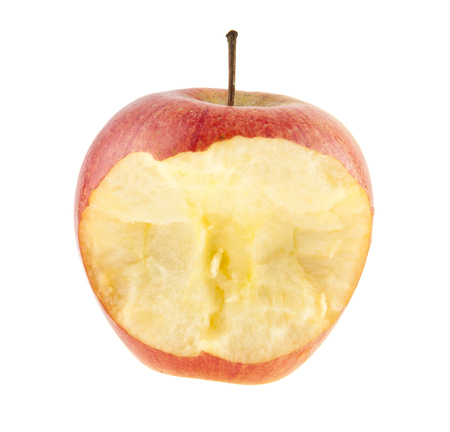 bitten red apple isolated on white backgroundの写真素材