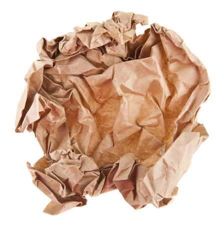 brown wrinkled paper isolated on white background close-upの写真素材