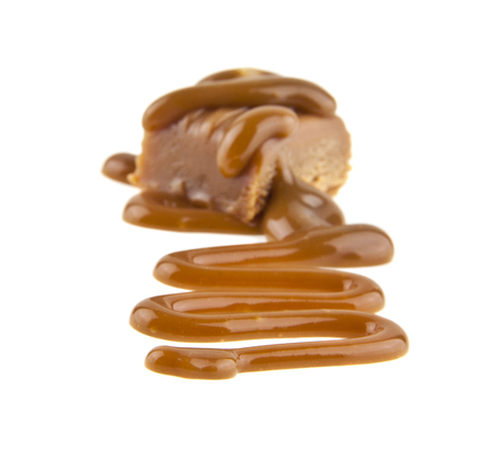 caramel isolated on white background closeupの写真素材