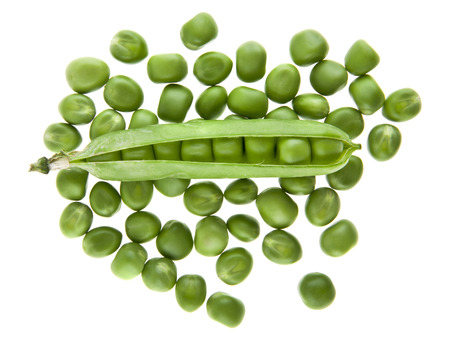 Green peas isolated on white background closeupの写真素材
