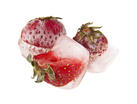 Strawberry in ice isolated on white backgroundの写真素材