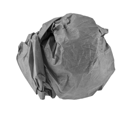 lump of crumpled gray paper isolated on white backgroundの写真素材