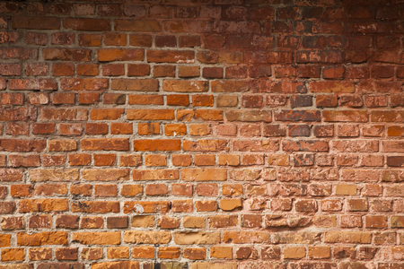 old red brick wall as a backgroundの写真素材