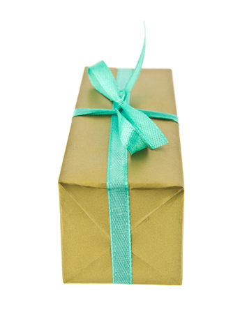 golden box with green ribbon, gift isolated on white backgroundの写真素材
