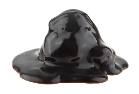 candy cane in chocolate isolated on white backgroundの写真素材
