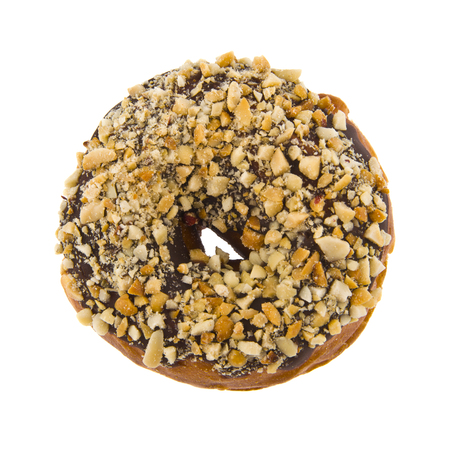 donut in chocolate with nuts isolated on white backgroundの写真素材