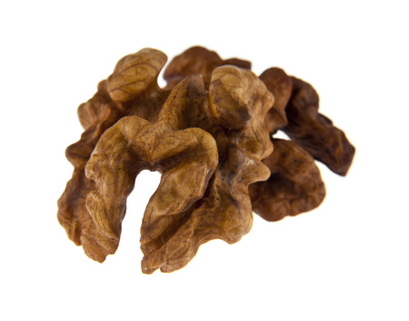 walnut kernels isolated on white backgroundの写真素材