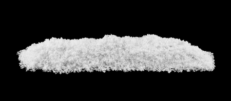 pile of white snow isolated on black backgroundの写真素材