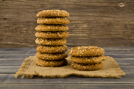Cookies with seeds on a woodenの写真素材