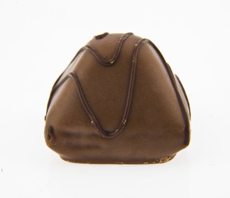 Candy cane chocolate isolated on whiteの写真素材