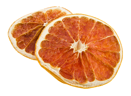 Sliced grapefruit isolated on whiteの写真素材