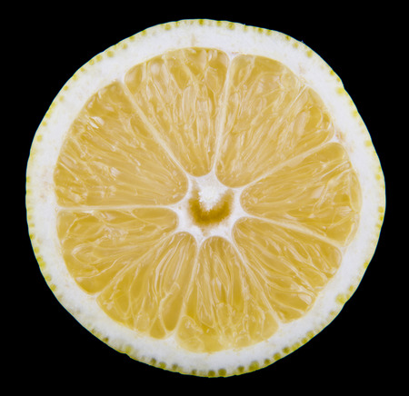 Lemon isolated on blackの写真素材