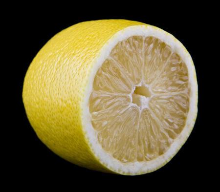 Lemon isolated on blackの写真素材
