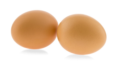 chicken eggs isolated on white backgroundの写真素材
