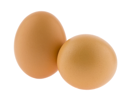 chicken eggs isolated on white backgroundの写真素材