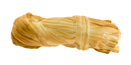 smoked cheese pigtail isolated on white backgroundの写真素材
