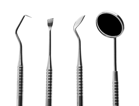 dentist tools isolated on white backgroundの写真素材