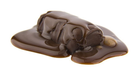 chocolate candy covered with chocolate isolated on white backgroundの写真素材