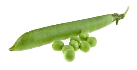green peas isolated on white background close upの写真素材