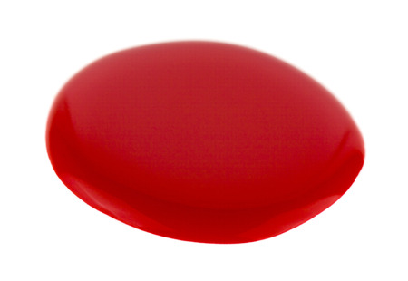 blot red nail polish isolated on white background close up