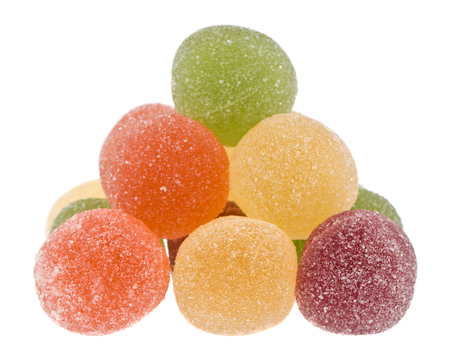 pyramid of marmalade balls isolated on white background close upの写真素材