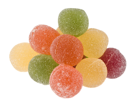 pyramid of marmalade balls isolated on white background close upの写真素材