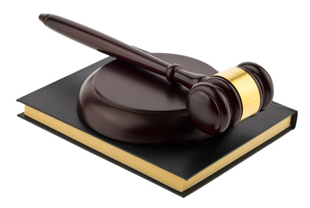wooden gavel and book isolated on white backgroundの写真素材