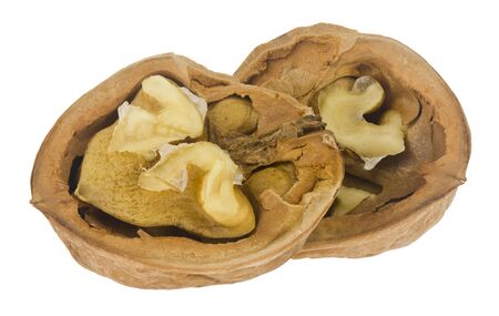 Broken walnut isolated on a white background.の写真素材
