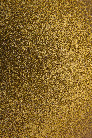 Texture of golden shiny background as a background. Decor element for invitation, wedding cards, Valentine's day, greeting card.の写真素材
