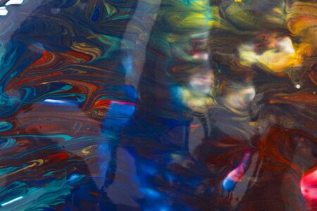 Red-yellow-blue abstract multicolor liquid background, painting, paint splash, colorful paintの写真素材