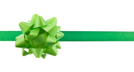 Green ribbon with bow isolated on white background.の写真素材