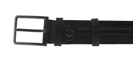 Black male leather belt isolated on a white background close-up. Beauty and fashion concept.の写真素材