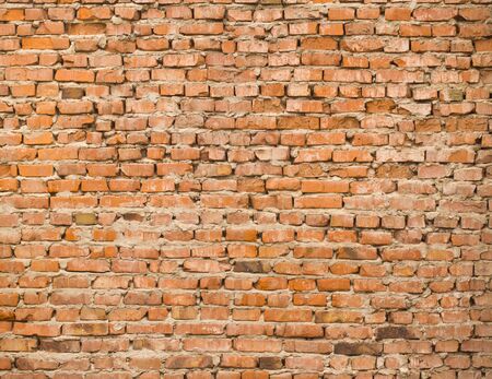 Texture of an old wall with red brick for background.の写真素材