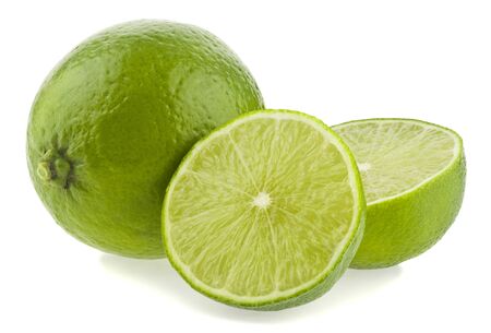 Green lime isolated on a white background with a light shadow.の写真素材