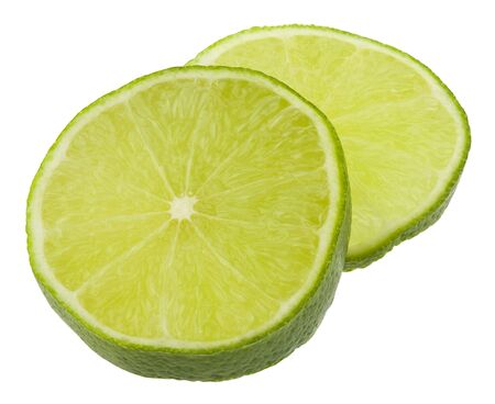 Green lime isolated on a white background with a light shadow.の写真素材