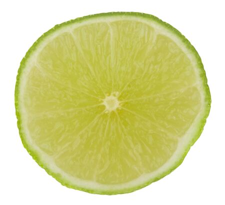 Sliced lime green isolated on white background close-up.の写真素材