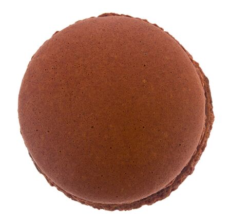 Brown macaroon isolated on a white background close-up. View from above. Sweets dessert.の写真素材