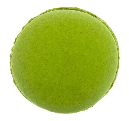 Green macaroon isolated on white background close-up. View from above. Sweets dessert.の写真素材