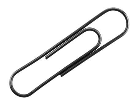 Metal paper clip isolated on white background close-up.の写真素材