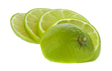 Sliced lime green isolated on a white background close-up. Macro, full focusの写真素材
