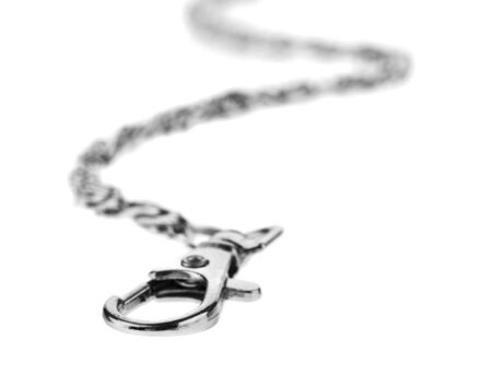 Metal chain with lock isolated on a white background close-up.の写真素材
